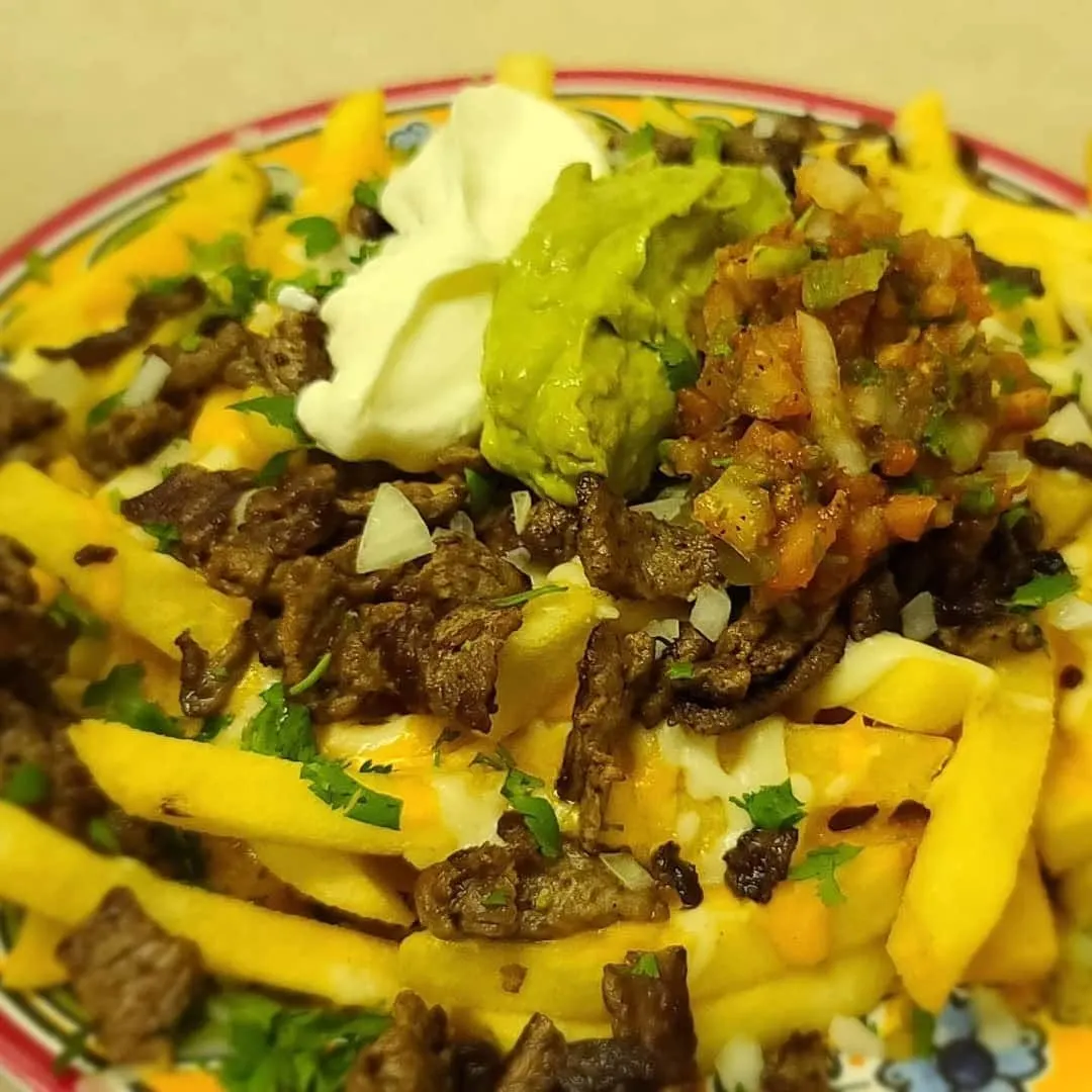 Papas con Carne Asada